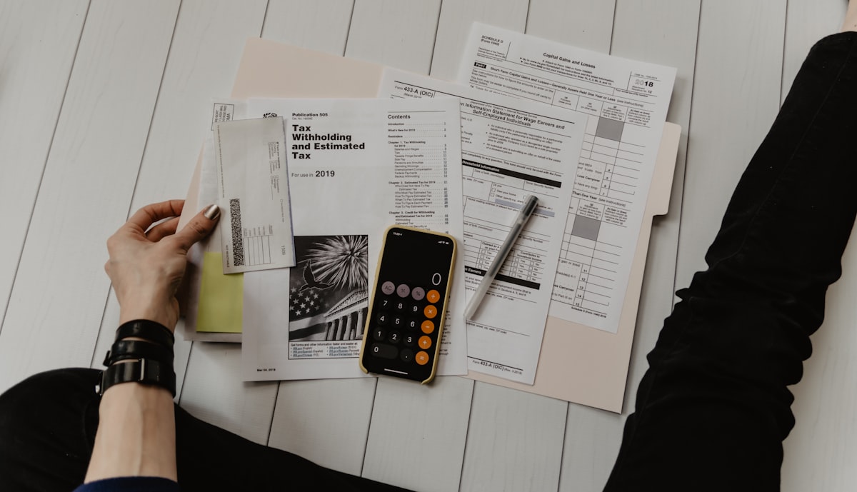 Invoice and calculator on a desk